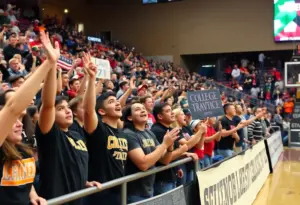 Fans cheering at the UTEP Miners basketball game against Missouri State Bears